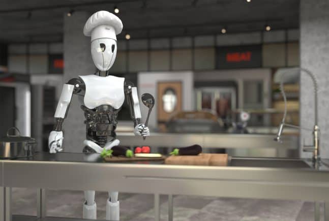 Humanoider Roboter-Koch in einer Küche